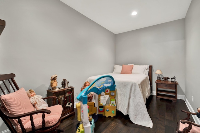 bedroom featuring dark hardwood / wood-style floors