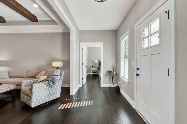 entryway with beamed ceiling and dark wood-type flooring