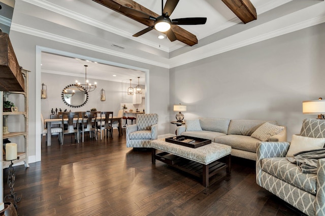 living room with beam ceiling, ceiling fan with notable chandelier, dark wood-type flooring, and ornamental molding