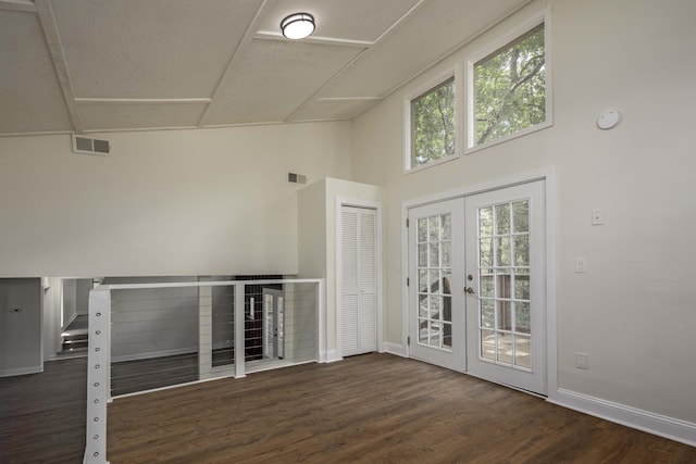 34 Miller Cove Cir, Signal Mountain, TN 37377 - empty room featuring wood finished floors, french doors, and a high ceiling