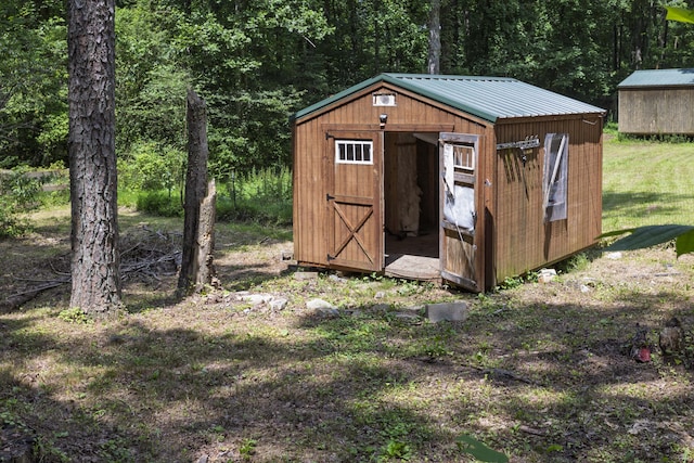 34 Miller Cove Cir, Signal Mountain, TN 37377 - view of shed featuring a view of trees