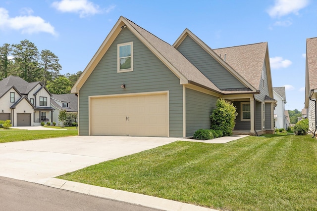 9614 Mulberry Gap Way, Ooltewah, TN 37363 - view of front of house featuring a garage, a front yard, a shingled roof, and driveway