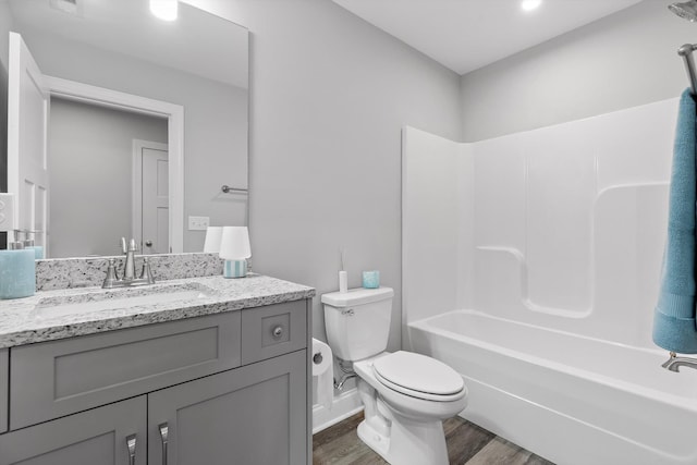 9614 Mulberry Gap Way, Ooltewah, TN 37363 - bathroom featuring wood finished floors, vanity, and shower / washtub combination