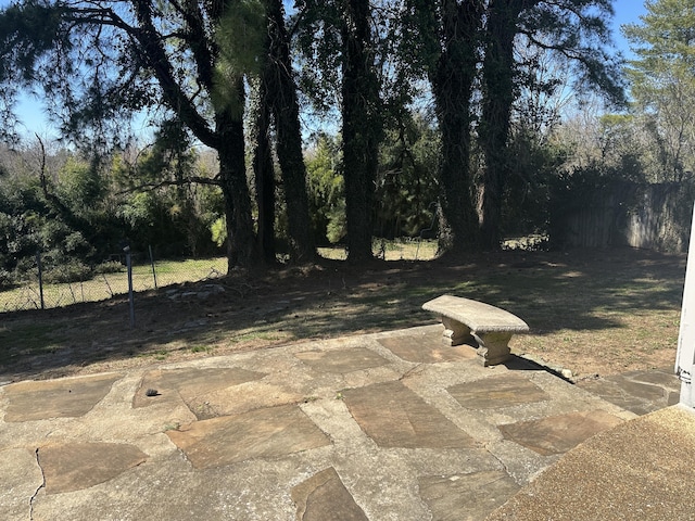 view of patio / terrace featuring fence