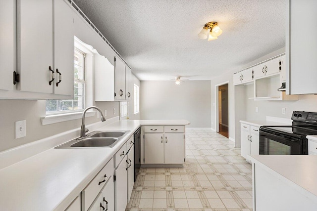 373 Kile Ln SW, Cleveland, TN 37311 - kitchen featuring black range with electric stovetop, a sink, light floors, a peninsula, and dishwasher