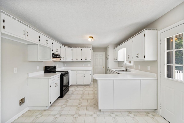 373 Kile Ln SW, Cleveland, TN 37311 - kitchen with black electric range oven, a sink, under cabinet range hood, light floors, and a textured ceiling