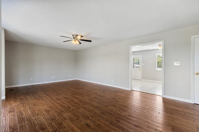 373 Kile Ln SW, Cleveland, TN 37311 - spare room with a ceiling fan, wood finished floors, baseboards, and a textured ceiling
