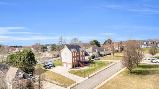 birds eye view of property with a residential view