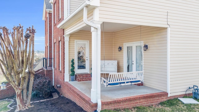 entrance to property with brick siding