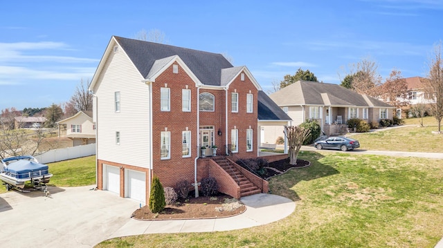 view of front of house featuring a garage, brick siding, stairway, fence, and a front yard