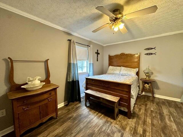 2996 Sugar Grove Valley Rd, Harriman, TN 37748 - bedroom featuring dark wood finished floors, a textured ceiling, ceiling fan, baseboards, and ornamental molding