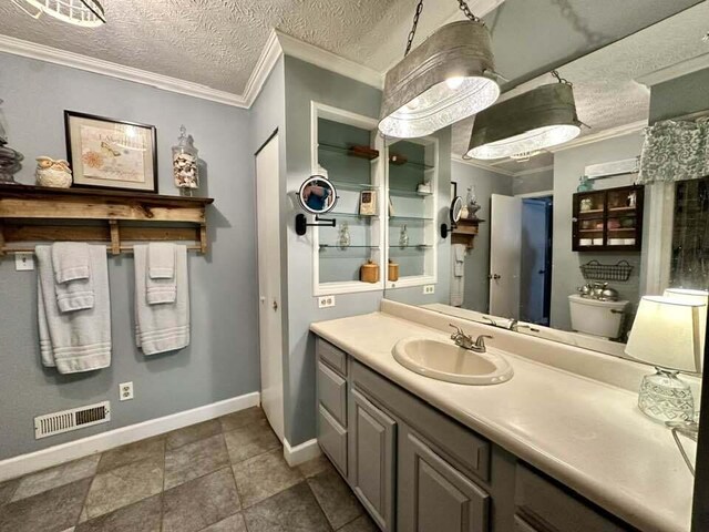 2996 Sugar Grove Valley Rd, Harriman, TN 37748 - bathroom featuring ornamental molding, a textured ceiling, baseboards, and vanity