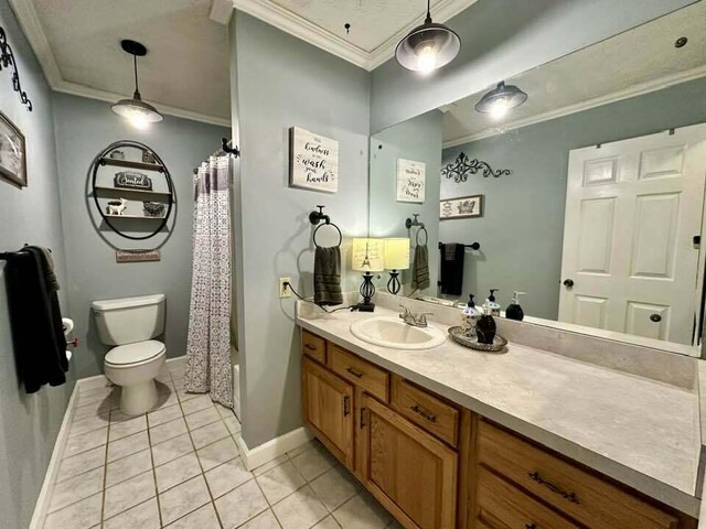 2996 Sugar Grove Valley Rd, Harriman, TN 37748 - bathroom featuring ornamental molding, toilet, vanity, baseboards, and tile patterned flooring