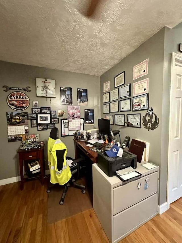 2996 Sugar Grove Valley Rd, Harriman, TN 37748 - office area with wood finished floors, a textured ceiling, and baseboards