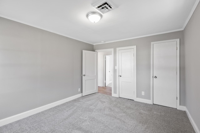 1704 Georgetown Rd NW, Cleveland, TN 37311 - unfurnished bedroom featuring baseboards, visible vents, carpet floors, and ornamental molding