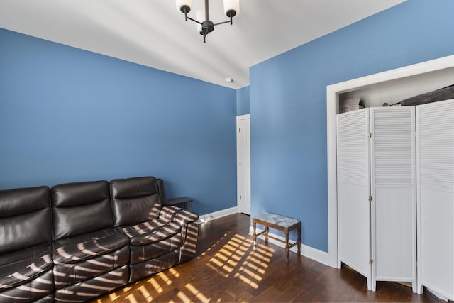 unfurnished living room with dark wood-type flooring