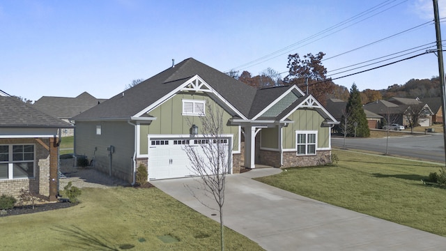 view of front of house with a front lawn and a garage