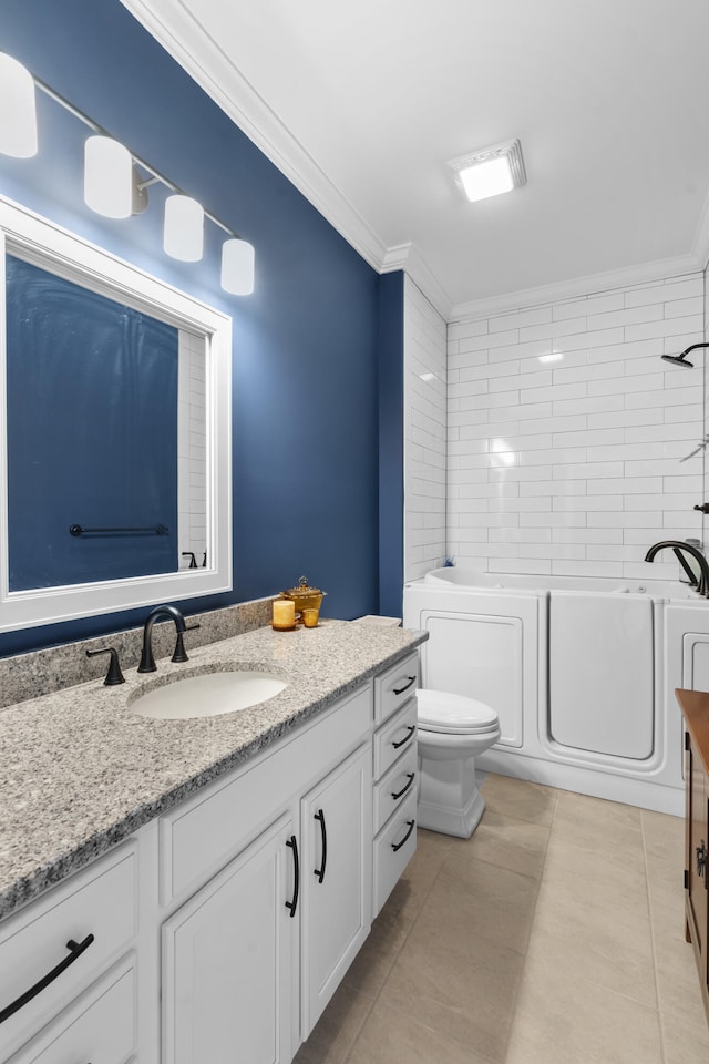 full bathroom featuring ornamental molding, vanity, tile patterned flooring, toilet, and tiled shower / bath