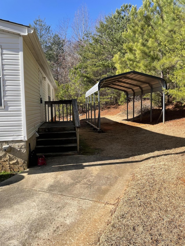 view of parking / parking lot featuring a carport