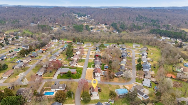 bird's eye view with a residential view and a view of trees