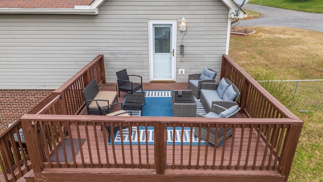 wooden deck featuring an outdoor hangout area