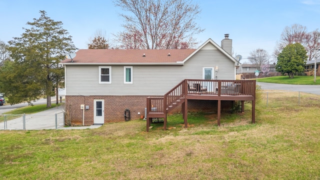 back of house with fence, stairs, a lawn, a chimney, and a deck