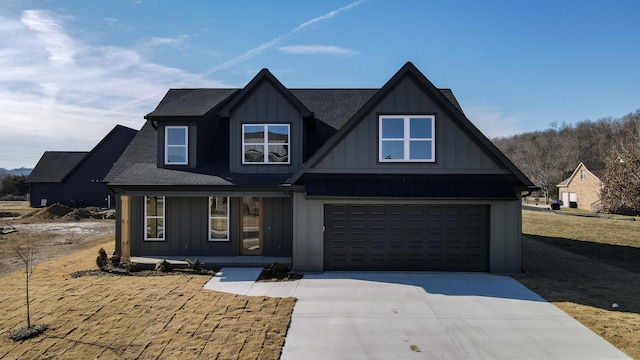 view of front of house with a garage and a porch