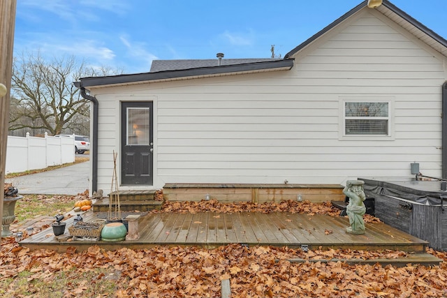 back of house featuring a deck