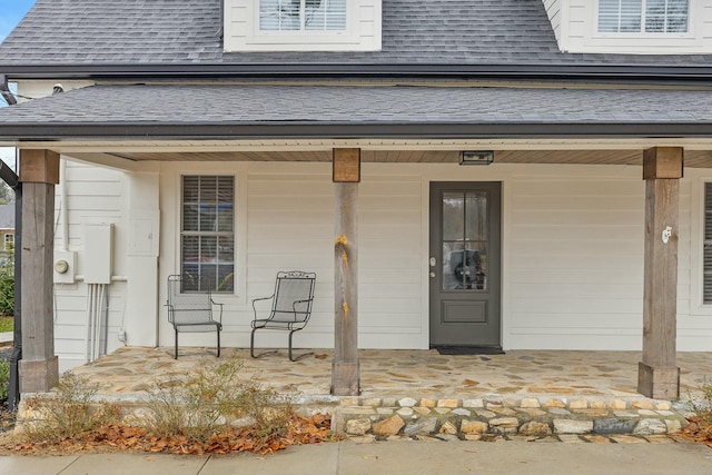 doorway to property featuring a porch