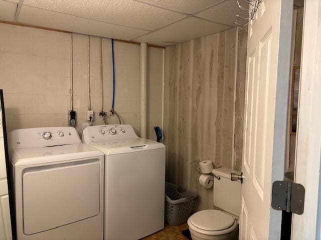 laundry room with separate washer and dryer