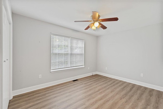 242 Mulberry Ln NE, Cleveland, TN 37312 - unfurnished room with wood finished floors and a ceiling fan
