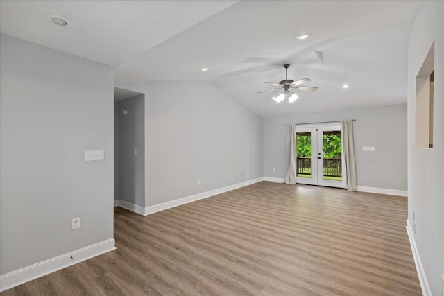 242 Mulberry Ln NE, Cleveland, TN 37312 - empty room featuring french doors, wood finished floors, a ceiling fan, lofted ceiling, and recessed lighting