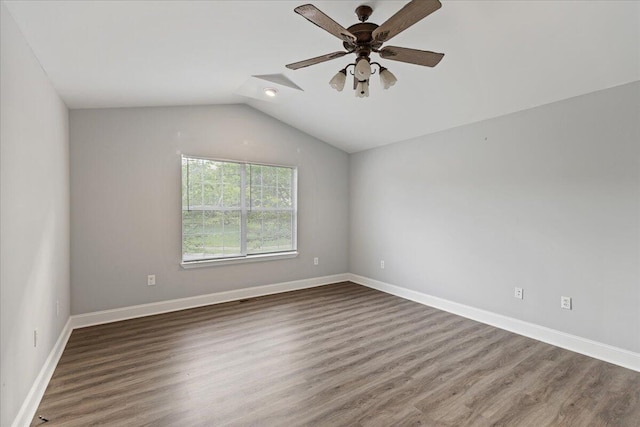 242 Mulberry Ln NE, Cleveland, TN 37312 - empty room featuring wood finished floors, vaulted ceiling, and a ceiling fan