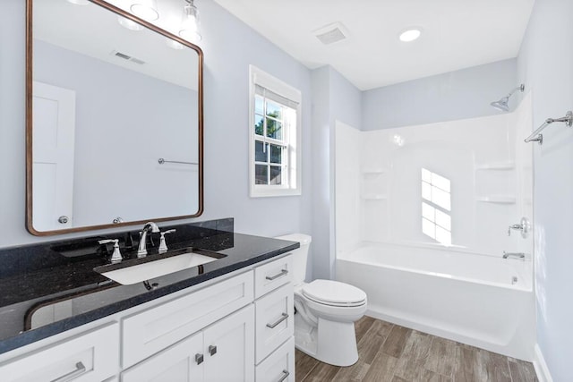 605 Westover Dr SW, Cleveland, TN 37311 - full bathroom with vanity, wood finished floors, and shower / bath combination