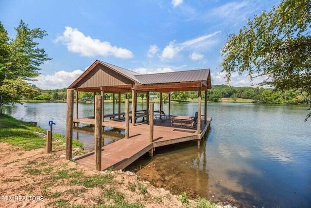 dock area featuring a water view