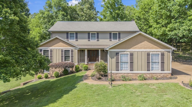 view of front of home with a front lawn