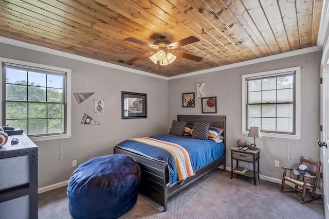 bedroom with carpet flooring, ceiling fan, wood ceiling, and crown molding