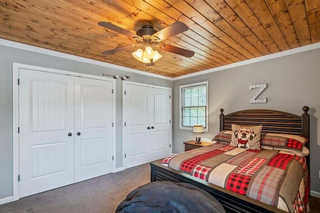 carpeted bedroom with ceiling fan, crown molding, and wooden ceiling