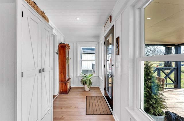 hall with light wood-type flooring