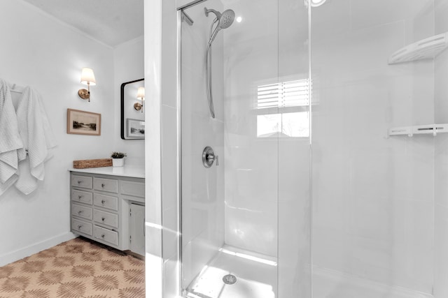 full bathroom featuring a shower stall and vanity