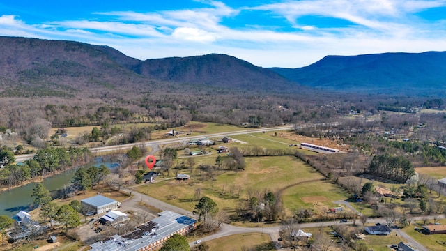 bird's eye view featuring a mountain view and a rural view