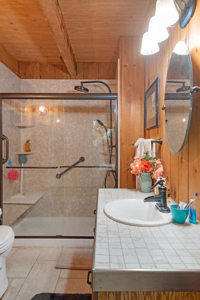 bathroom featuring an enclosed shower, wood ceiling, vanity, toilet, and beam ceiling