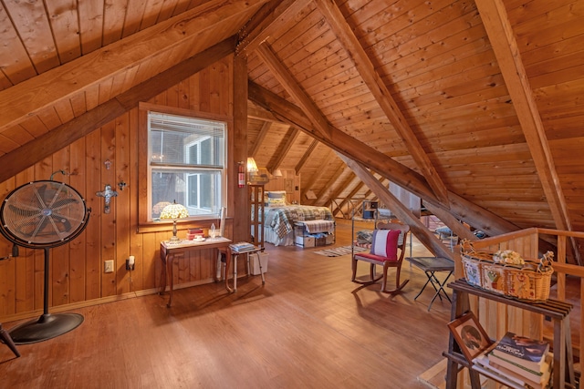 additional living space featuring vaulted ceiling with beams, hardwood / wood-style floors, wooden walls, and wooden ceiling