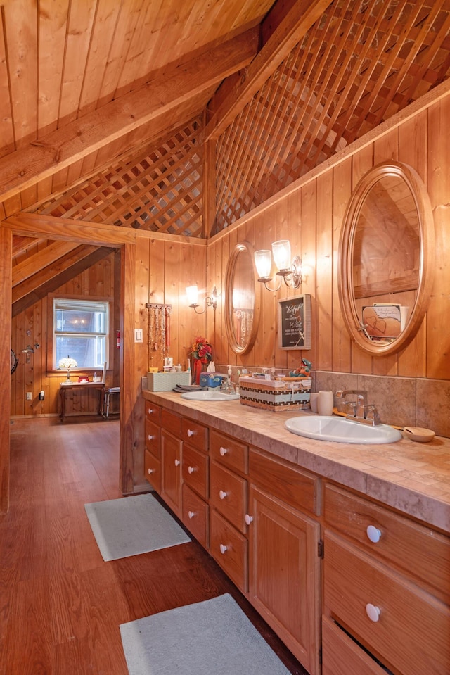 bathroom featuring hardwood / wood-style flooring, wood walls, lofted ceiling with beams, and wood ceiling