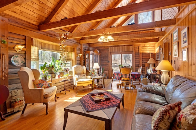 living room featuring wood ceiling, beamed ceiling, light hardwood / wood-style floors, rustic walls, and a notable chandelier