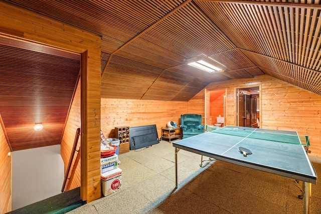 game room featuring wood walls, carpet, wooden ceiling, and lofted ceiling