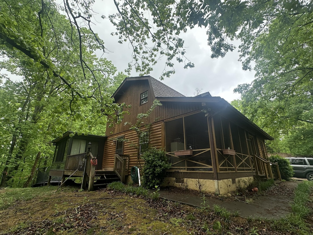 1250 Dellview Way SW, Cleveland, TN 37311 - exterior space featuring a sunroom, a gambrel roof, and a deck