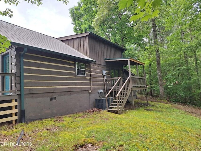 125 Hiwassee Cir, Reliance, TN 37369 - back of property featuring stairs, metal roof, crawl space, a deck, and board and batten siding