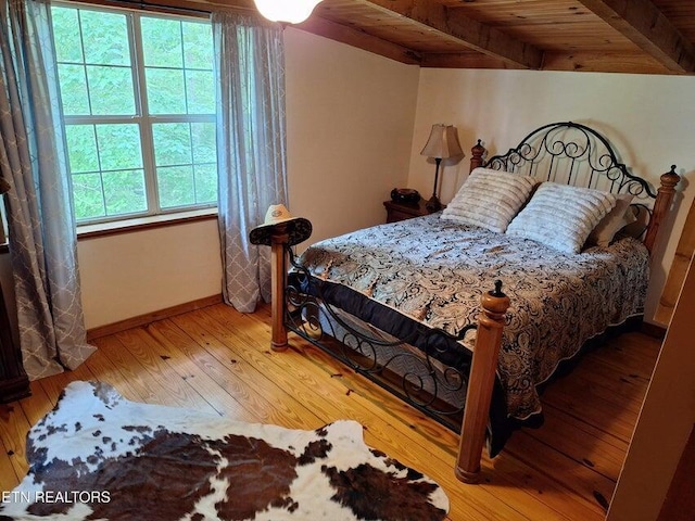 125 Hiwassee Cir, Reliance, TN 37369 - bedroom featuring hardwood / wood-style floors, wood ceiling with exposed beams, and baseboards