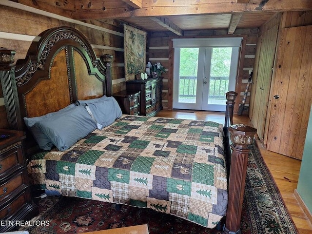 125 Hiwassee Cir, Reliance, TN 37369 - bedroom with french doors, wood ceiling with exposed beams, wood finished floors, wood walls, and access to exterior